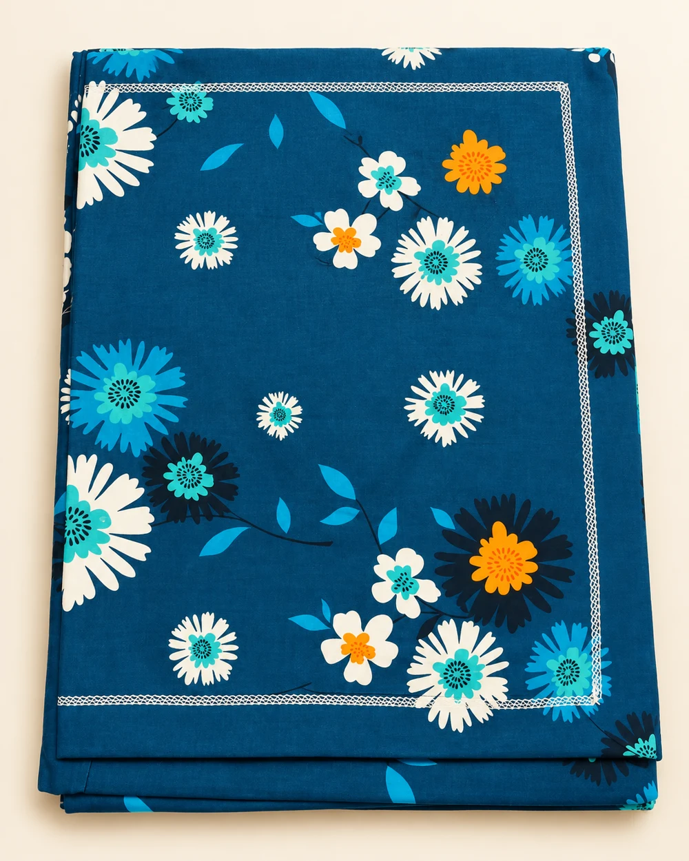 Teal Meadow printed bedsheet, folded to show its design