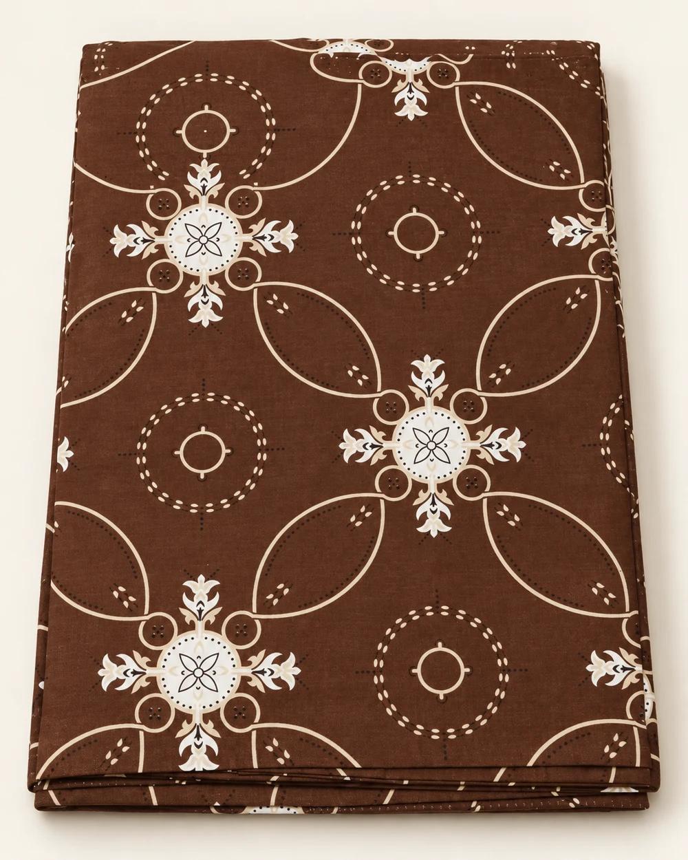 Cocoa Medallion printed bedsheet, folded to show its design