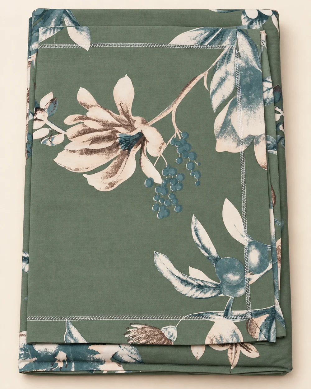 Sage Botanical printed bedsheet, folded to show its design