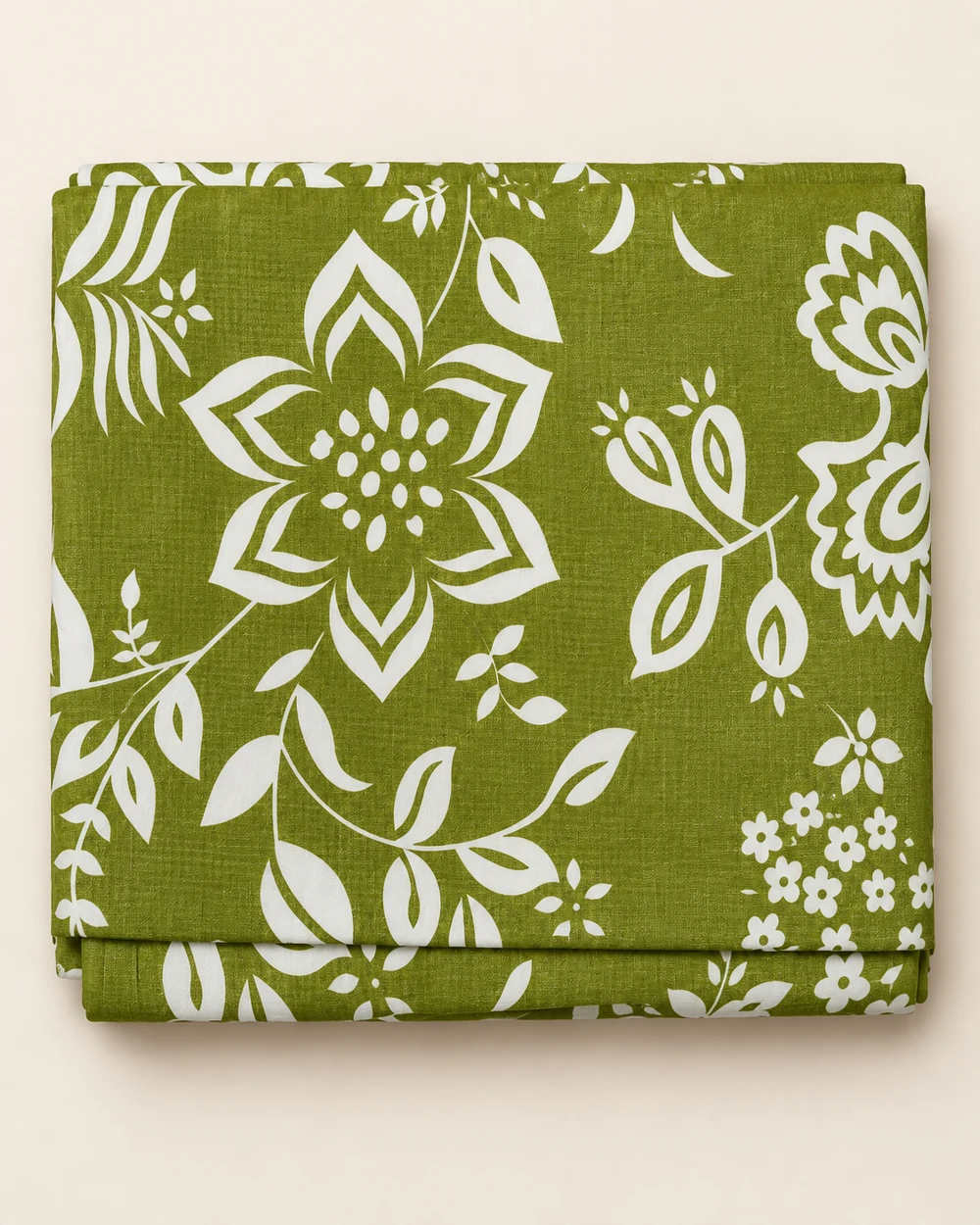 Olive Blossom printed bedsheet, folded to show its design