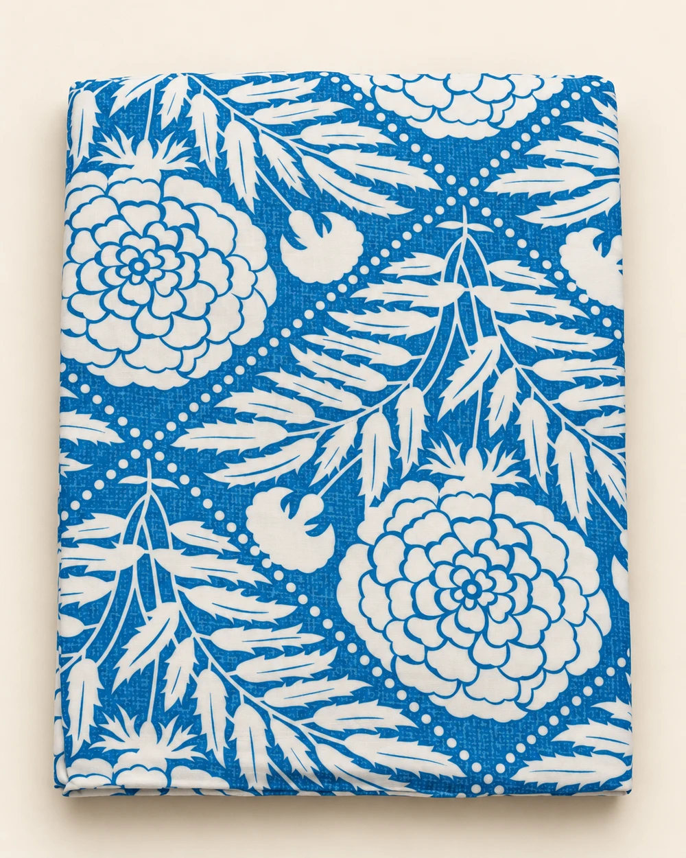 Blue and white floral bedsheet detail